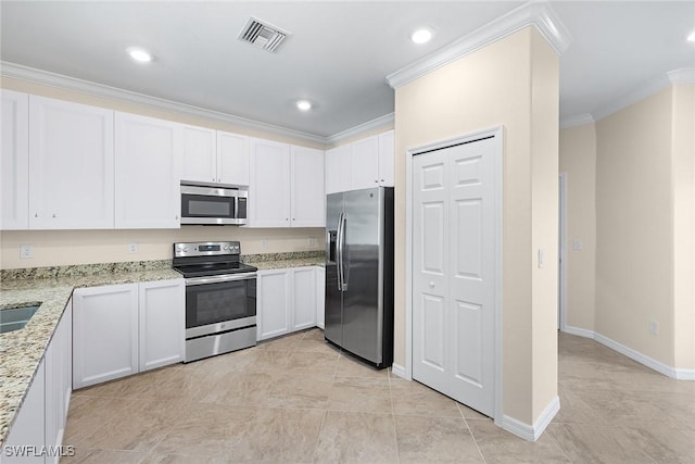 kitchen featuring light stone counters, stainless steel appliances, visible vents, white cabinetry, and ornamental molding