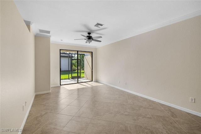 empty room featuring baseboards, ceiling fan, visible vents, and crown molding