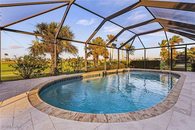 view of pool featuring a patio and a lanai