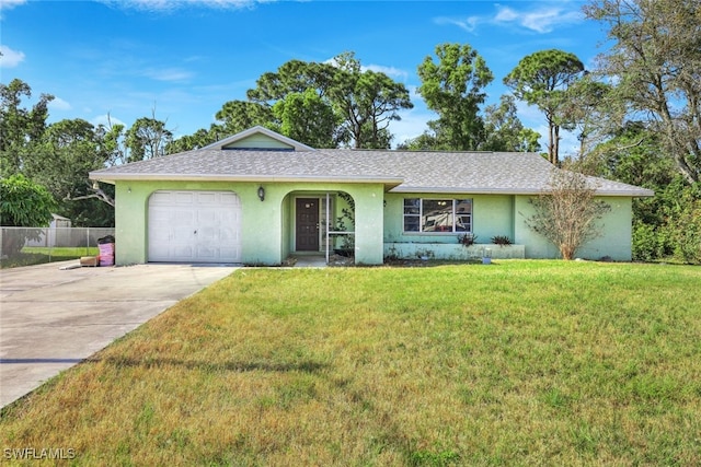 ranch-style home with a garage and a front lawn