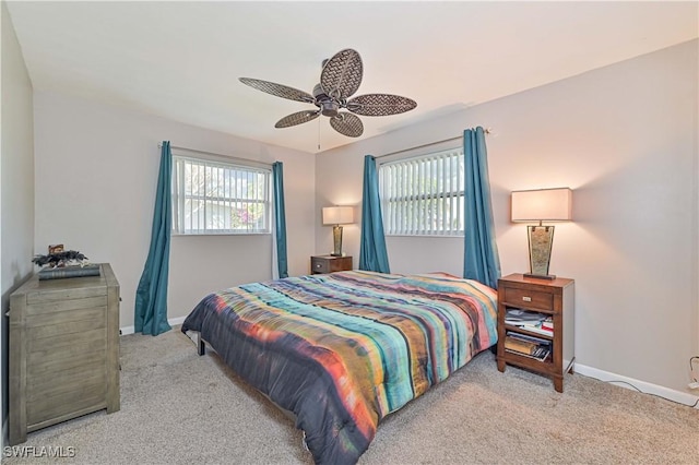 bedroom with light carpet and ceiling fan