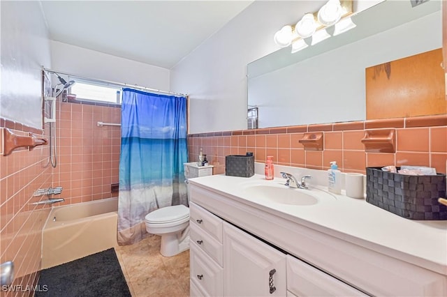 full bathroom with shower / bath combination with curtain, vanity, toilet, and tile walls