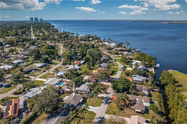 bird's eye view with a water view