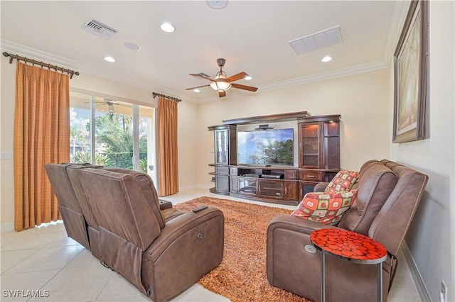 living room featuring light tile patterned flooring, ornamental molding, and ceiling fan