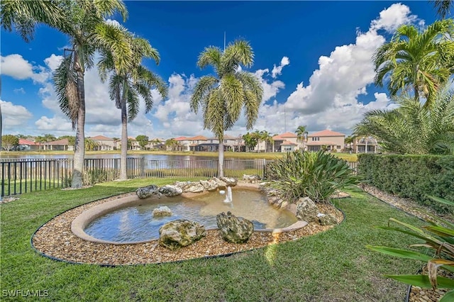 view of yard with a water view