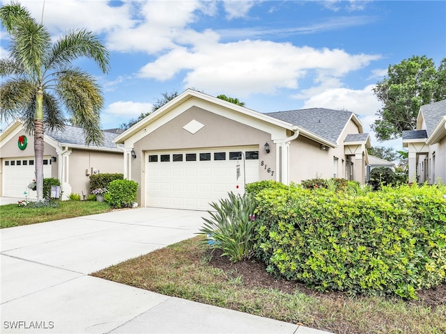 single story home featuring a garage