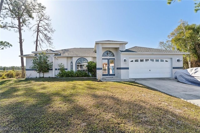 ranch-style house with french doors, a front lawn, and a garage