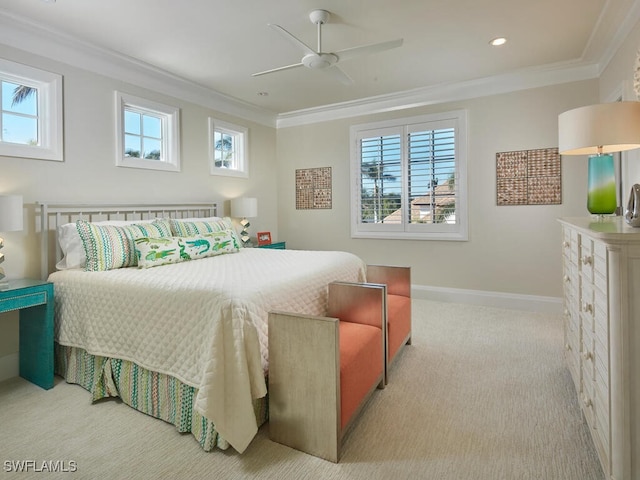 bedroom with ceiling fan, light colored carpet, and ornamental molding