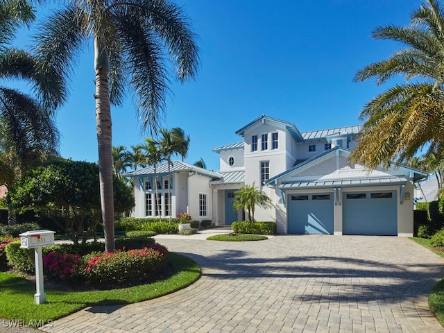 view of front of home with a garage