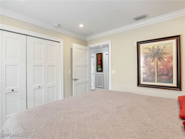 unfurnished bedroom featuring a closet and ornamental molding