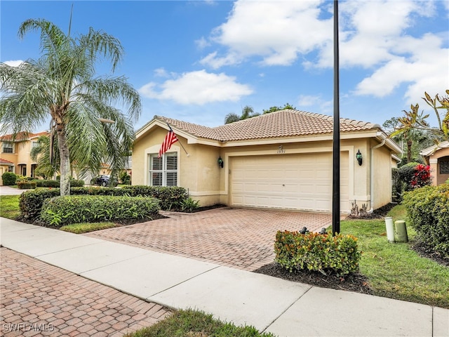 view of front of home with a garage