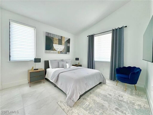 bedroom with vaulted ceiling