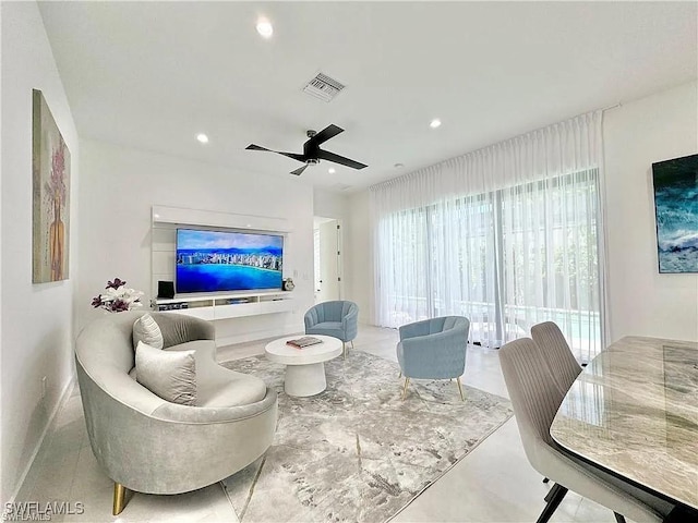 living room featuring ceiling fan