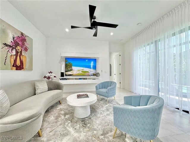 living room featuring ceiling fan