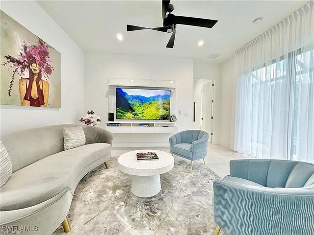 living room featuring ceiling fan