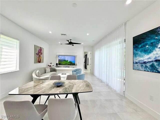 living room with ceiling fan