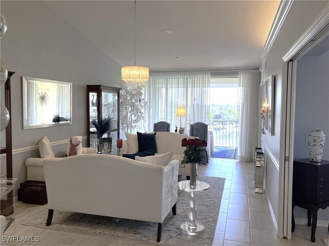 living room featuring lofted ceiling and light tile patterned floors