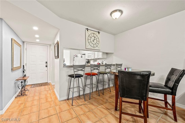 view of tiled dining space