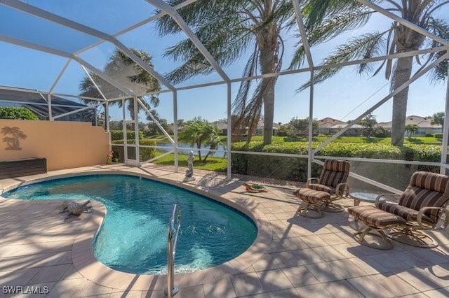 view of pool featuring a patio area and a lanai