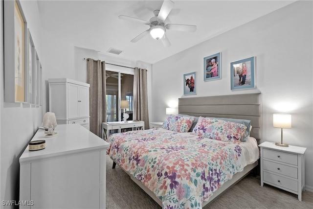 carpeted bedroom with ceiling fan