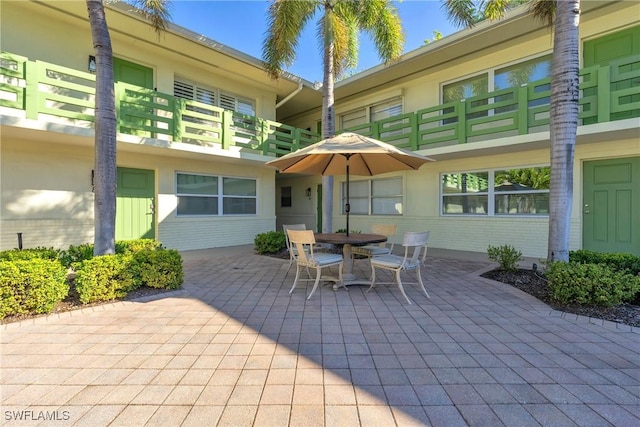 view of patio / terrace with a balcony