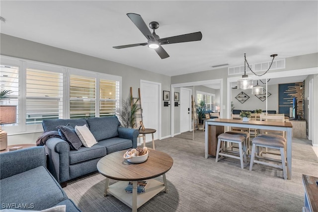 living room featuring ceiling fan