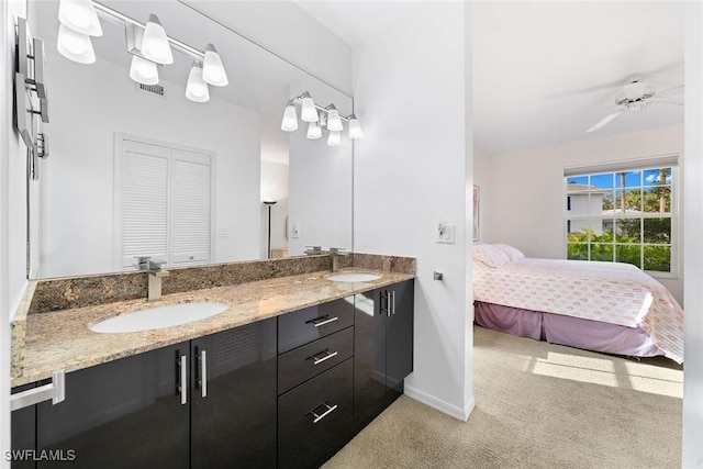 bathroom with vanity and ceiling fan