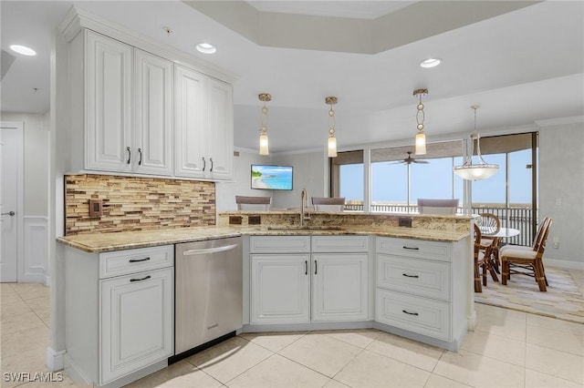 kitchen featuring ceiling fan, dishwasher, sink, decorative backsplash, and white cabinets