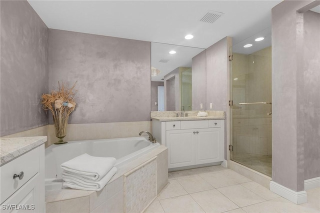 bathroom with separate shower and tub, tile patterned floors, and vanity