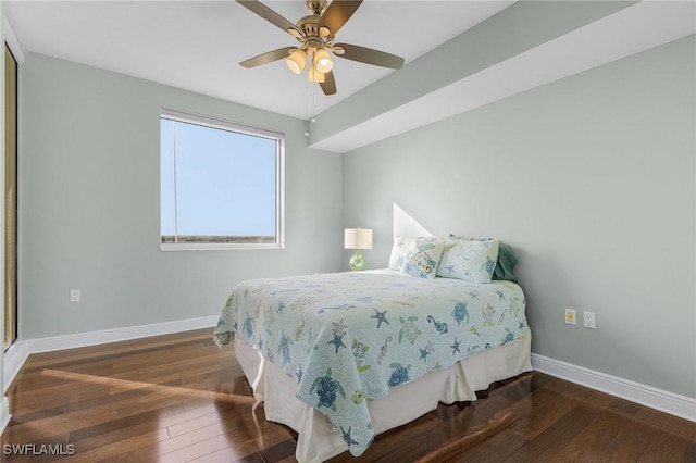 bedroom featuring ceiling fan and dark wood-type flooring