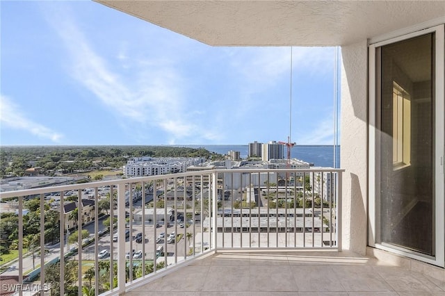 balcony featuring a water view