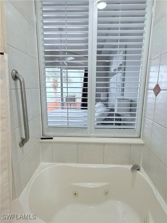8771 Estero Blvd Unit 103, Fort Myers Beach, FL 33931 - full bathroom with a tub with jets