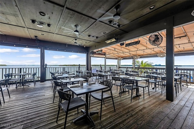 8771 Estero Blvd Unit 103, Fort Myers Beach, FL 33931 - deck featuring a water view and outdoor dining space