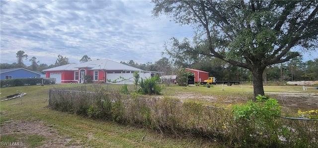 view of yard with a garage