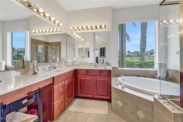 bathroom featuring vanity, separate shower and tub, tile patterned floors, and a wealth of natural light