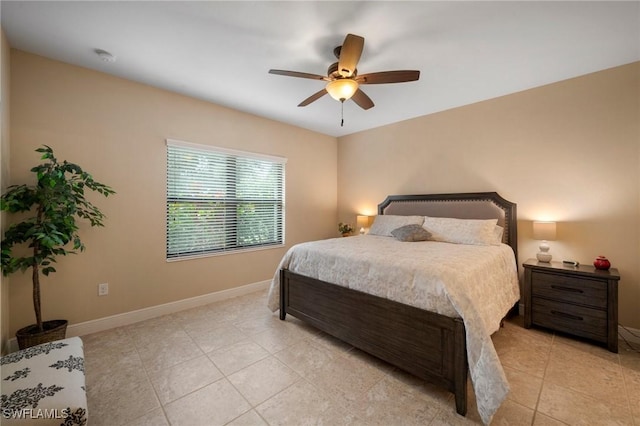 bedroom featuring ceiling fan and light tile patterned floors