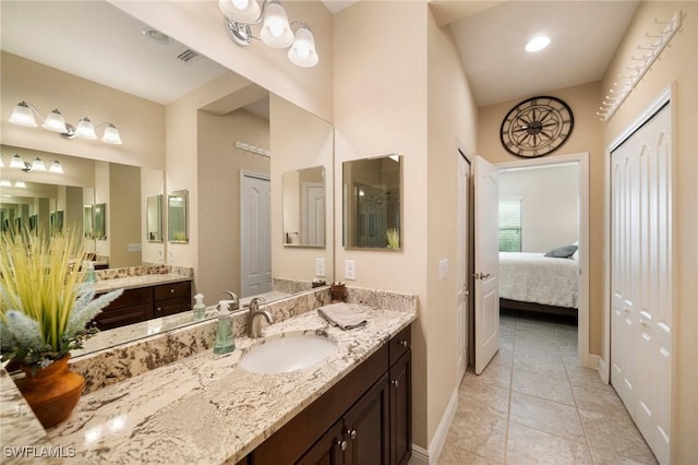 bathroom with vanity and tile patterned flooring