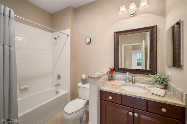 full bathroom with toilet, vanity, and shower / bath combo