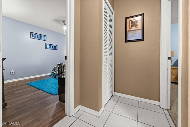 hallway with light tile patterned floors