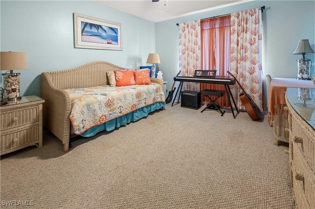 carpeted bedroom with ceiling fan