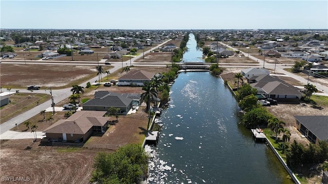 21 NE 19th Ter, Cape Coral, FL 33909 - bird's eye view with a water view and a residential view
