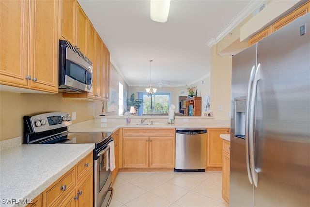 kitchen with a chandelier, light tile patterned flooring, ornamental molding, and appliances with stainless steel finishes