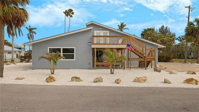 view of front of property with a deck