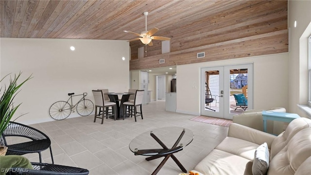 living room with wooden ceiling, high vaulted ceiling, french doors, ceiling fan, and light tile patterned floors