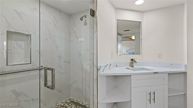 bathroom featuring vanity and walk in shower