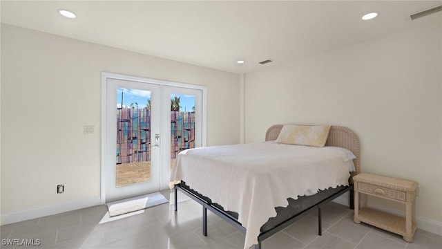 bedroom with light tile patterned floors, access to outside, and french doors