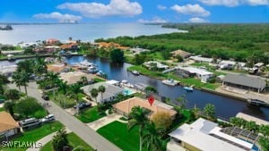 drone / aerial view with a water view