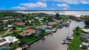 birds eye view of property featuring a water view