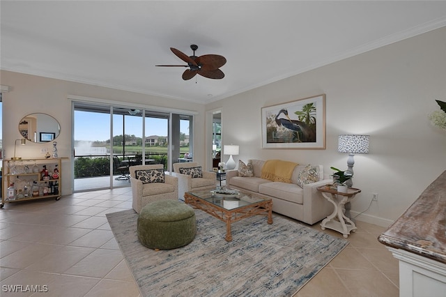 living room featuring light tile patterned floors, ceiling fan, and crown molding