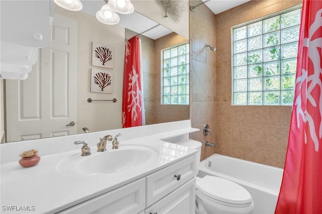 full bathroom featuring vanity, toilet, and shower / bath combo with shower curtain